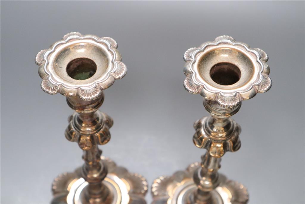 A pair of Victorian Old Sheffield plate candlesticks, 24cm